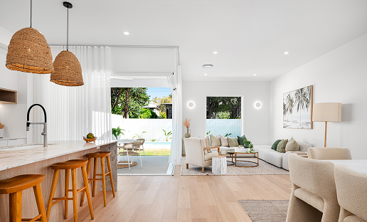 Open-plan kitchen and living area in a BESA knockdown rebuild home in Brisbane